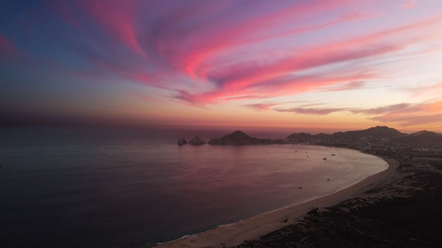 Aerial view of Cabo San Lucas and its bay at sunset